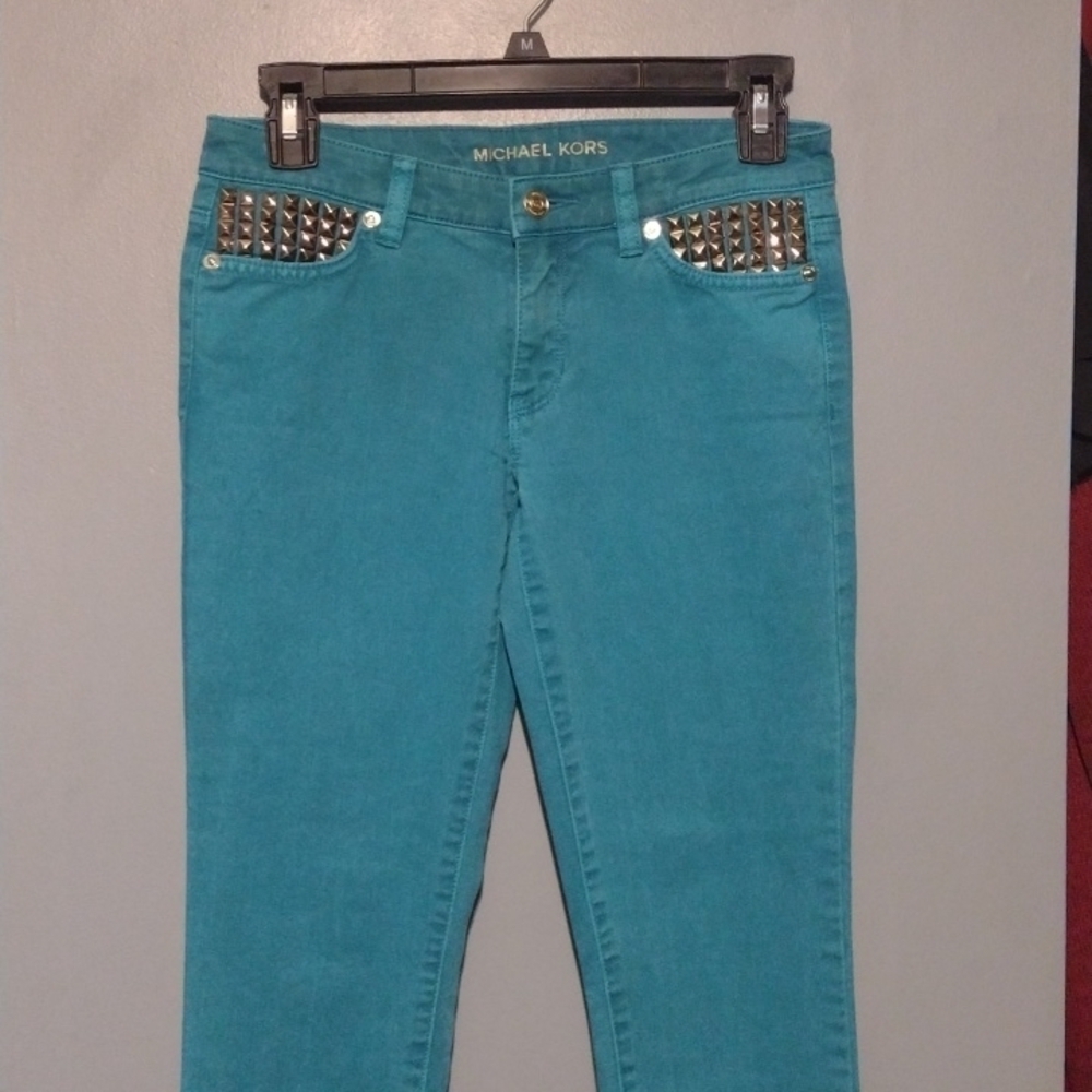 Studded turquoise/aqua/teal Michael Kors skinny jeans with gold studs size 0